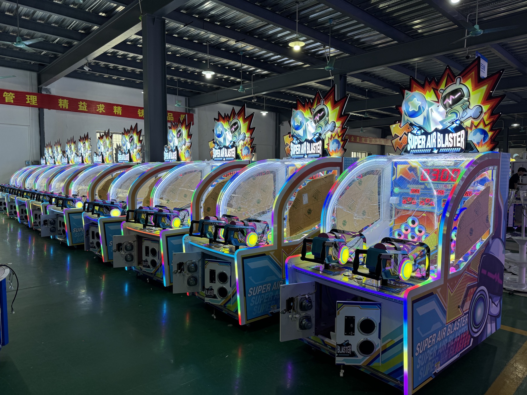 Arcade machines undergoing assembly and testing at Jiuyou