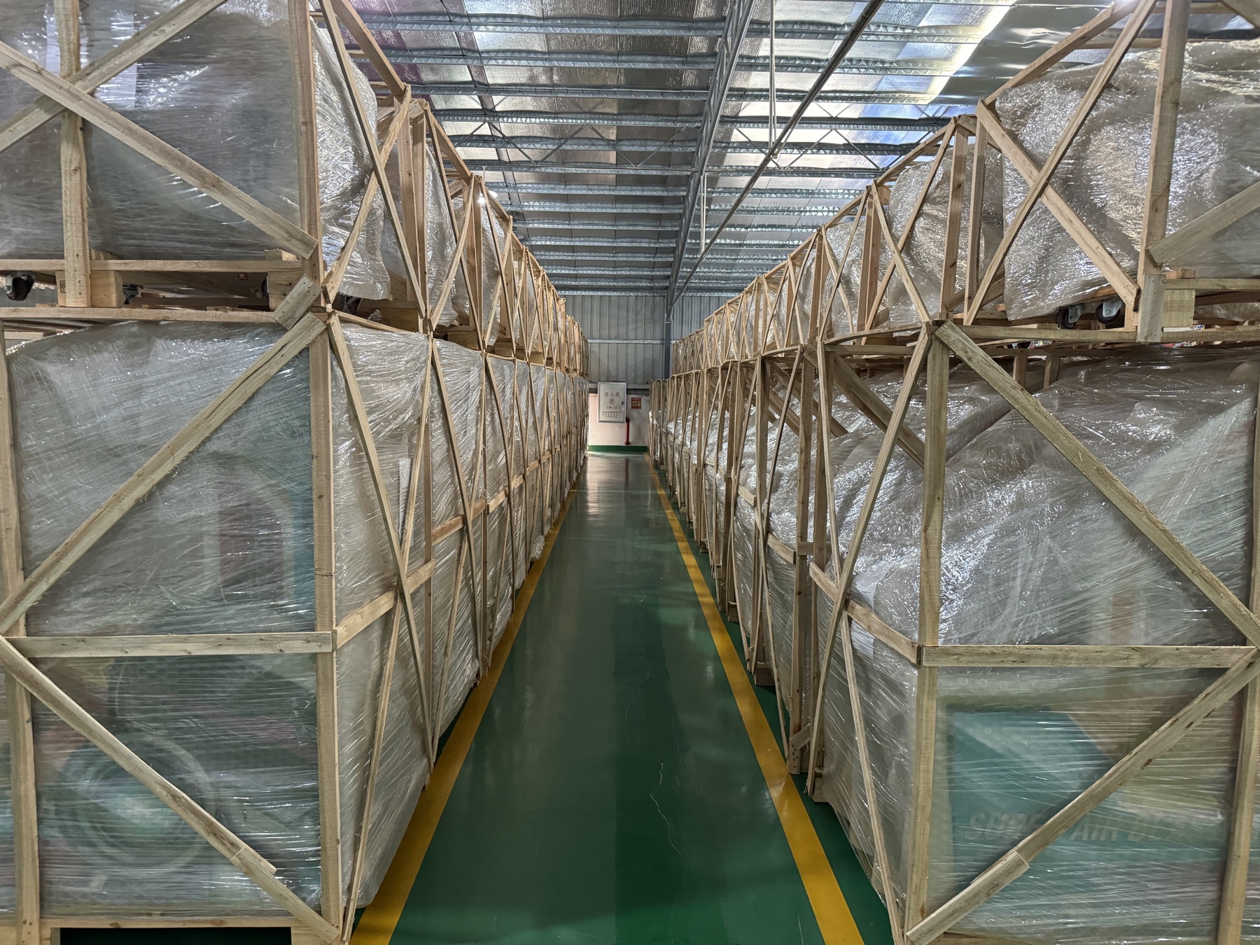 Jiuyou arcade machines secured in wooden export crates