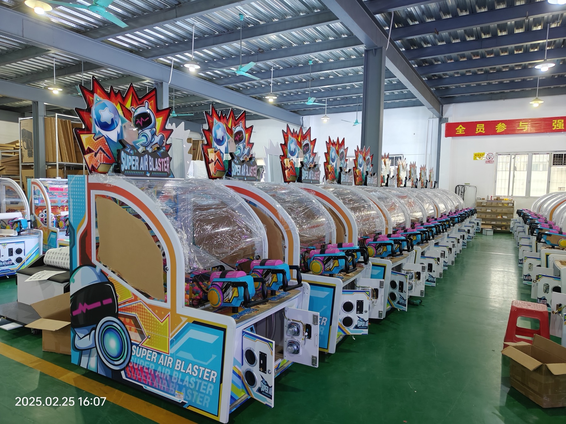 Rows of arcade machines being assembled inside Jiuyou factory in Guangzhou